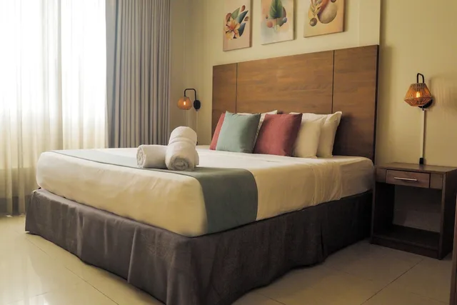 جناح إليت بسريرين كينج بغرفتي نوم مع أريكة بمطبخ صغير، City Suites Curacao 4/7