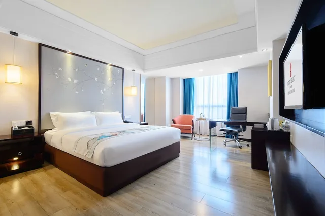 غرفة حصرية مفردة بسرير كوين، Pasonda Hotel Foshan 2/3