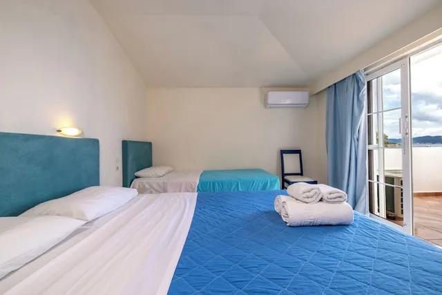 Family, 1 Double and 3 Single Beds، Porto Koukla Beach Hotel 2/10