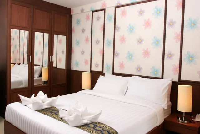 غرفة قياسية بسريرين منفصلين وسرير كوين، Orchid Resort 2/3