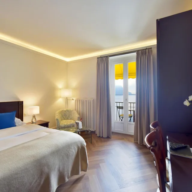 غرفة سوبيريور ثلاثية بسرير فردي بإطلالة على البحيرة، GOLF HOTEL RENE CAPT 2/9