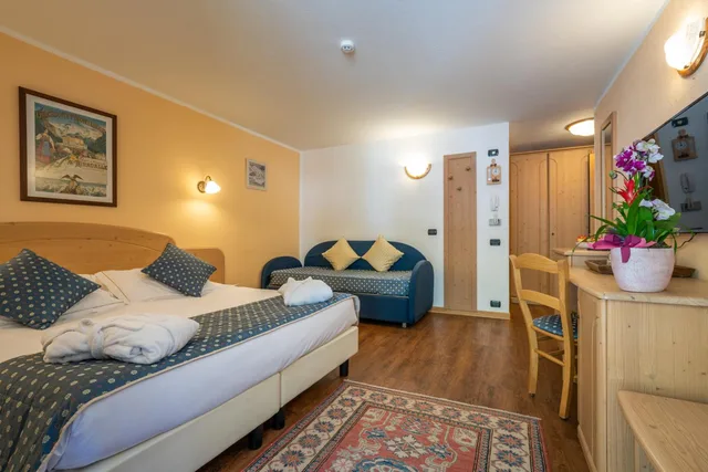 غرفة كبيرة بسرير مزدوج، Hotel Lo Scoiattolo 1/10