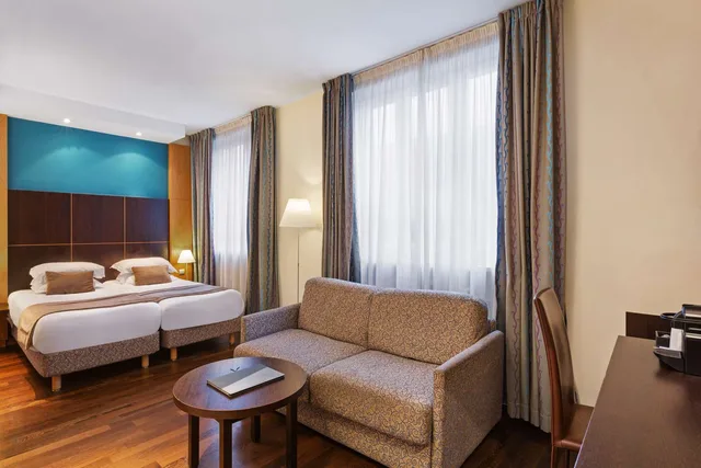 غرفة عائلية بسرير كوين وسريرين منفصلين مع أريكة، Best Western Plus Monopole Metropole 3/5