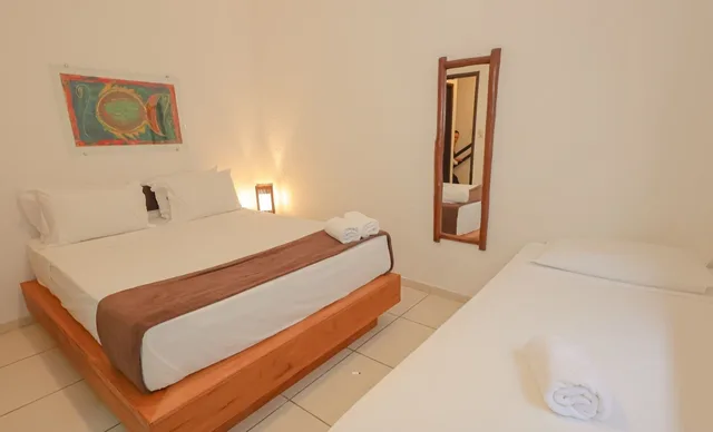 غرفة قياسية ثلاثية بسرير مزدوج وسرير فردي، Hotel Pousada Saudosa Maloca 1/4
