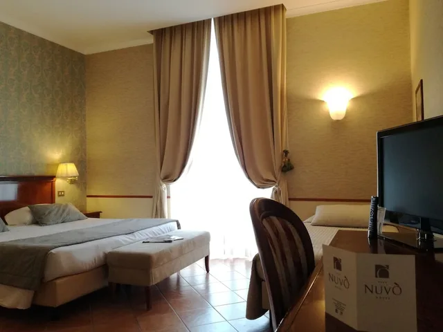 غرفة ثلاثية بسرير كينج وسرير فردي، Hotel Nuvo 2/9