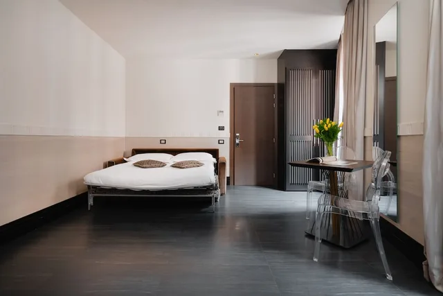 جناح فاخر بسرير كينج وسرير فردي مع أريكة، Unica Suite Rome 3/7