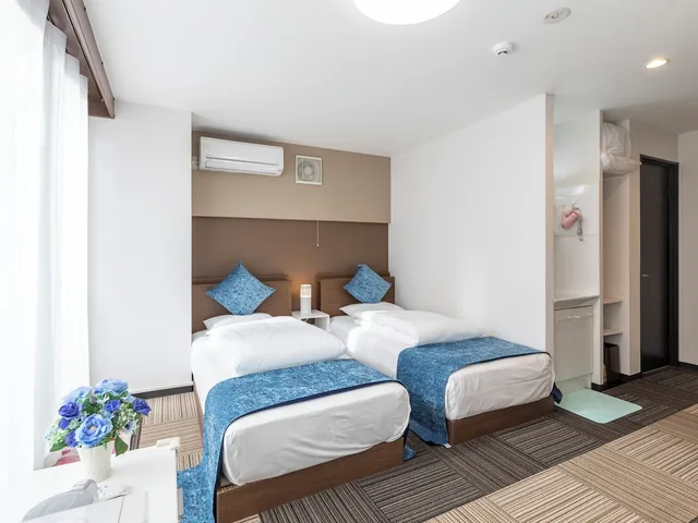غرفة ثلاثية بسرير مزدوج وسريرين منفصلين في الطابق العلوي، Sakuragawa Riverside Hotel 4/10
