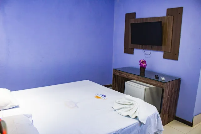 غرفة قياسية رباعية بسرير كوين وسريرين منفصلين، Hotel Luar De Itapua 6/9