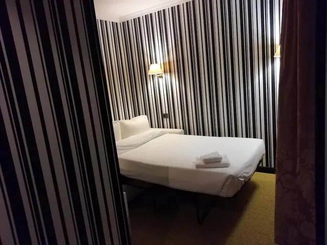 غرفة عائلية بسريرين منفصلين مع أريكة، Hotel Clarin 1/1