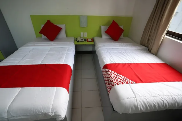 غرفة سوبيريور بسريرين منفصلين، OYO 210 Apple Tree Suites 2/5