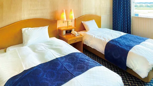 غرفة ديلوكس بسريرين منفصلين في المبنى الرئيسي، Hotel Grand Plaza Urashima 1/1