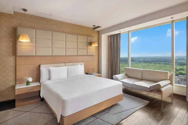 جناح بسرير فردي بغرفة نوم واحدة مع دخول صالة النادي، CROWNE PLAZA GREATER NOIDA 3/10