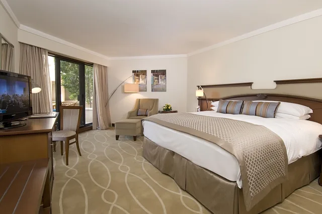 جناح تنفيذي بسرير كينج بإطلالة على الحديقة، Danat Al Ain Resort 3/7