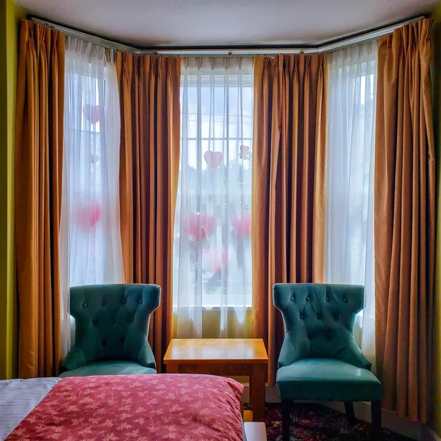 غرفة كلاسيكية بسرير كينج وسرير كوين، James Bay Inn Hotel Suites Cottage 6/8