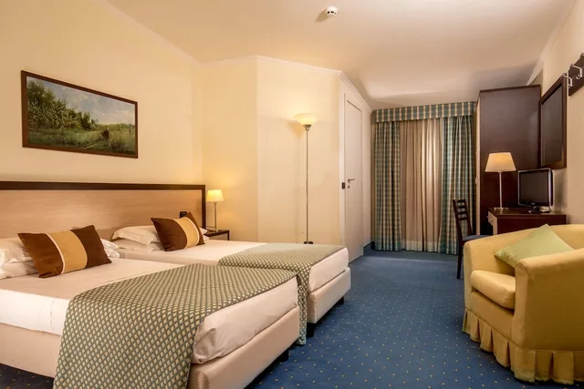 غرفة ثلاثية بسرير مزدوج وسرير فردي، Resort La Rocchetta 1/4