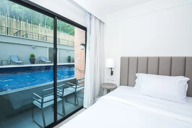 Superior, 2 Queen Beds, Pool Access، Sugar Marina Resort Cliffhanger Aonang 9/10