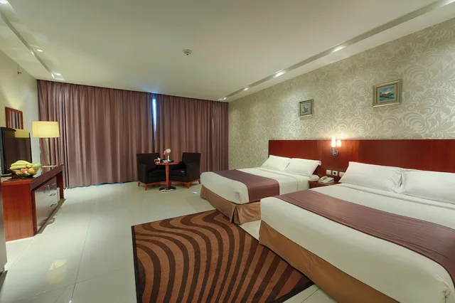 غرفة ديلوكس بسريرين كوين بإطلالة على المدينة، فندق جراند ميرال(Mayral Grand For Hotel Apartments) 1/5