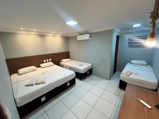غرفة قياسية رباعية بسرير كوين وسريرين منفصلين، Hotel Luar De Itapua 2/9