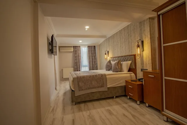 غرفة بسرير مزدوج مع أريكة، Avrasya Port Hotel 4/4