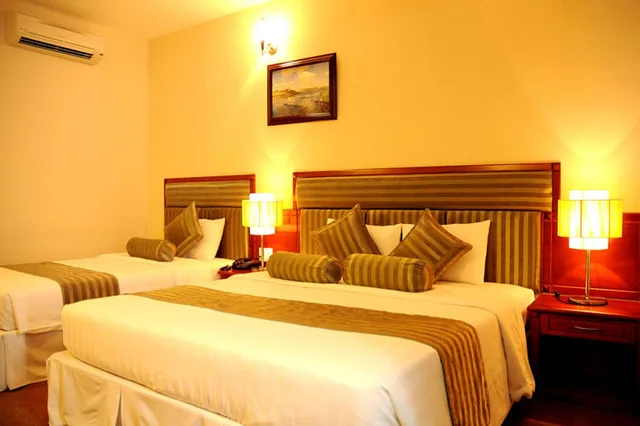 غرفة ديلوكس ثلاثية بسرير مزدوج وسرير فردي بإطلالة على البحر، The Coast Hotel 1/2
