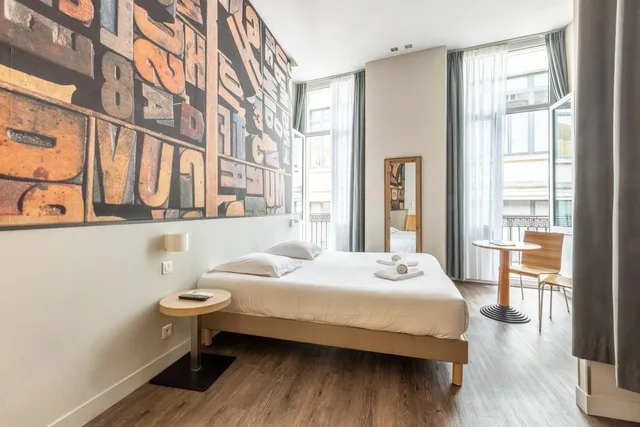 غرفة كومفورت بسرير كينج، Hotel De La Presse Bordeaux 1/2