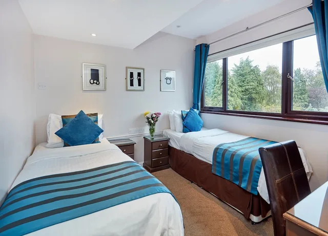 غرفة بسريرين منفصلين، Conifers Guest House 1/3