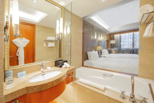 غرفة فاخرة بسريرين منفصلين بإطلالة على المدينة، Sofitel Harbin 5/9