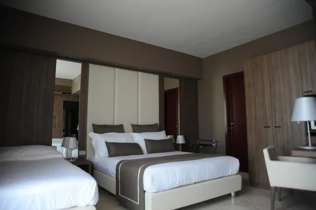 غرفة قياسية ثلاثية بسرير مزدوج وسرير فردي، Hotel Lafayette 2/3