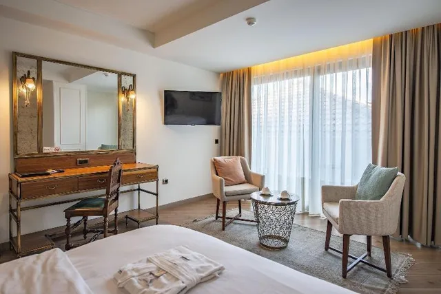 غرفة مفردة بسرير مزدوج بإطلالة جزئية على البحر، Casa Margot Hotel - Adults Only 1/1