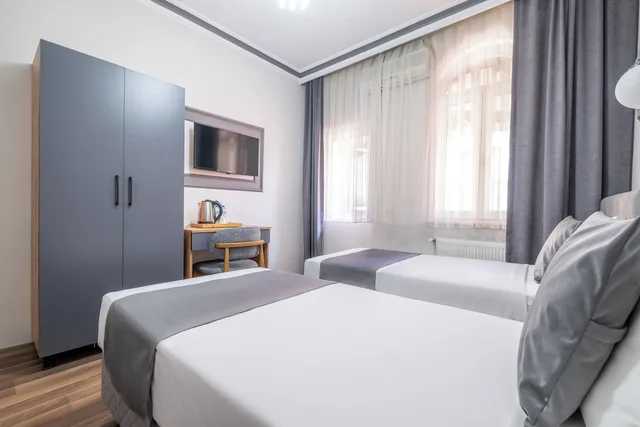 غرفة اقتصادية مفردة بسرير مزدوج، Sur Hotel 1/10