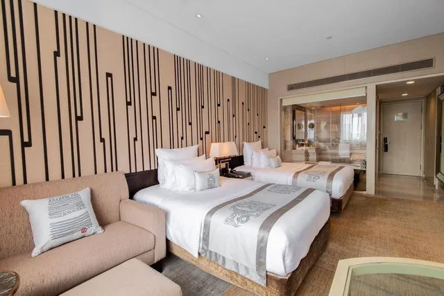 غرفة مريحة بزنس ديلوكس بسريرين، Grand Pacific Hotel Ningbo 1/1