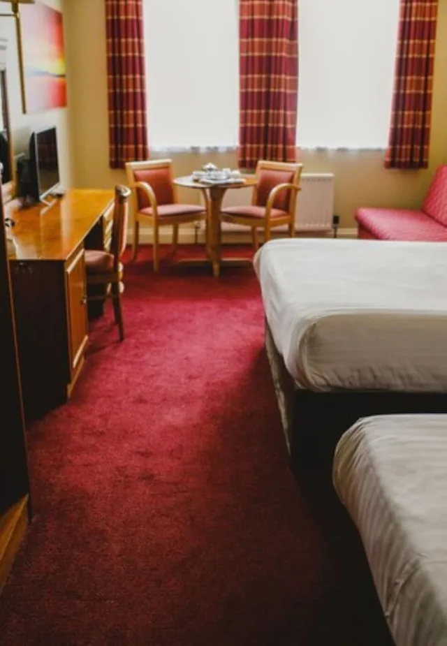 غرفة بسريرين منفصلين وسرير كينج وسرير فردي، Inn On The Coast 7/10
