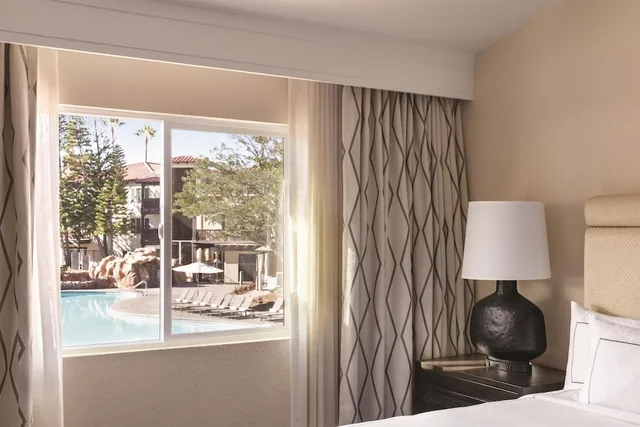 Suite, King Bed, Pool View, Sofa, Zachari Dunes on Mandalay Beach, Curio Collection by Hilton 2/2