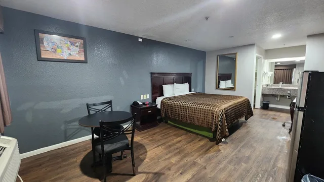 غرفة بسرير كينج، Express Inn Hobby Airport 5/8