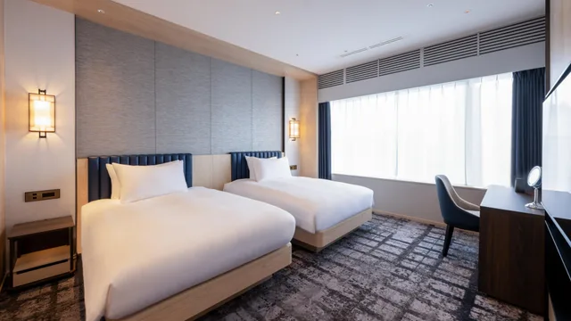 جناح بسريرين منفصلين مع دخول الصالة، ANA Crowne Plaza Akita by IHG 1/2