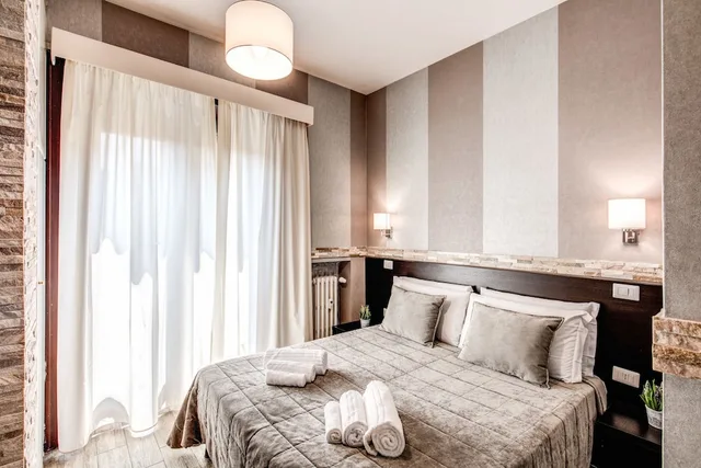 غرفة قياسية ثلاثية بسرير مزدوج، Santamaggiore Inn 5/10