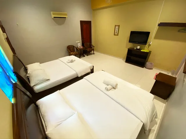 غرفة عائلية، Sabak Awor Resort by ZUZU 1/5