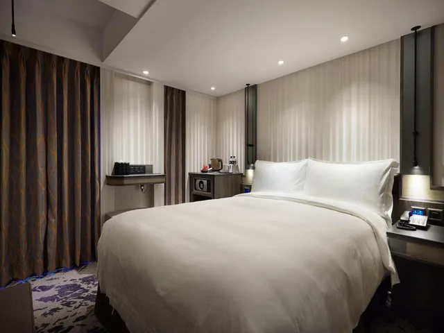 غرفة ديلوكس بسرير مزدوج بشرفة، Tango Inn Taipei Ximen 1/10