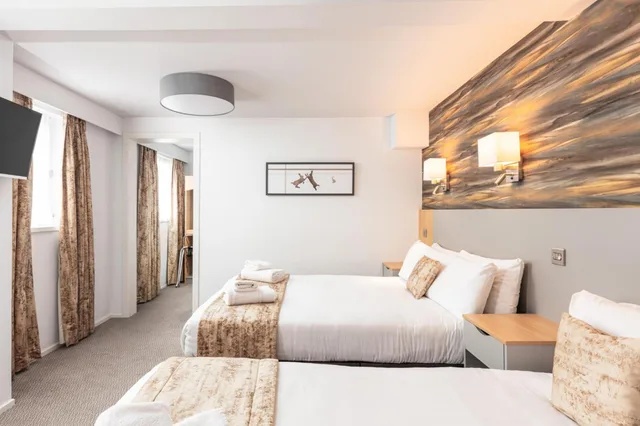 غرفة عائلية بسرير مزدوج وسرير فردي، Caledonian Hotel Ullapool 2/2