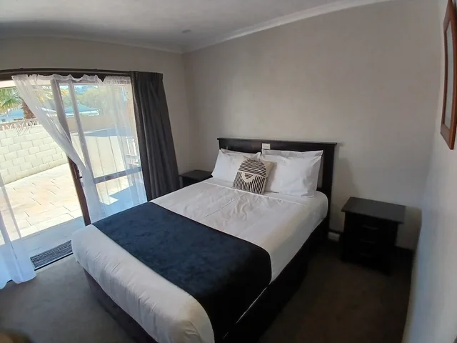 شقة عائلية بسرير مزدوج وسريرين منفصلين بغرفة نوم واحدة، Palm City Motor Inn 1/10