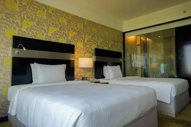 غرفة قياسية بسريرين منفصلين للمدخنين، Crowne Plaza Pune City Centre 2/5
