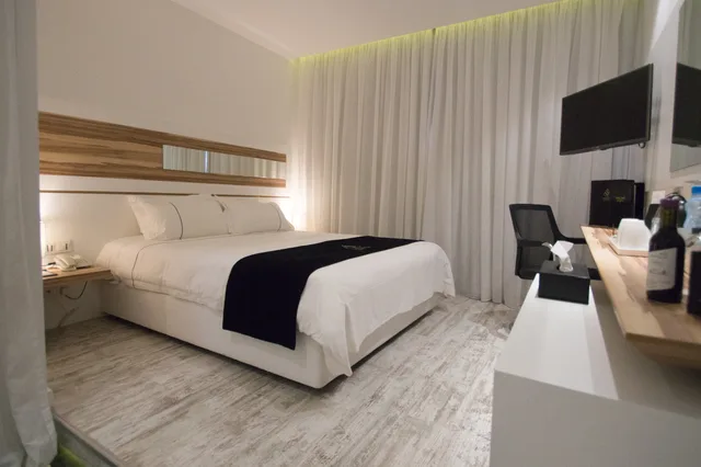Classic, Inland View, Balcony، The Ciao Stelio Deluxe Hotel - Adults Only 2/3