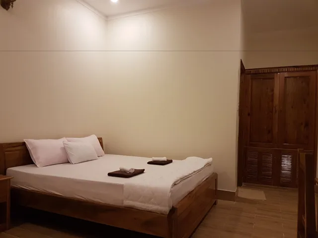 بنغل ديلوكس بسرير كينج بإطلالة على المسبح، Nhat Huy Bungalow 1/6