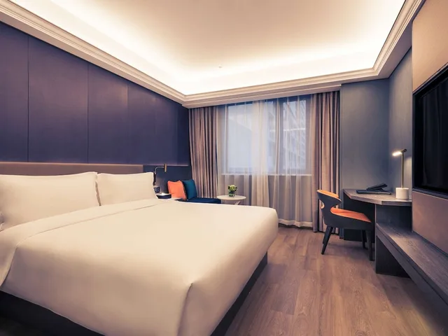 غرفة ديلوكس بسرير كينج، Mercure Shanghai Necc 1/8