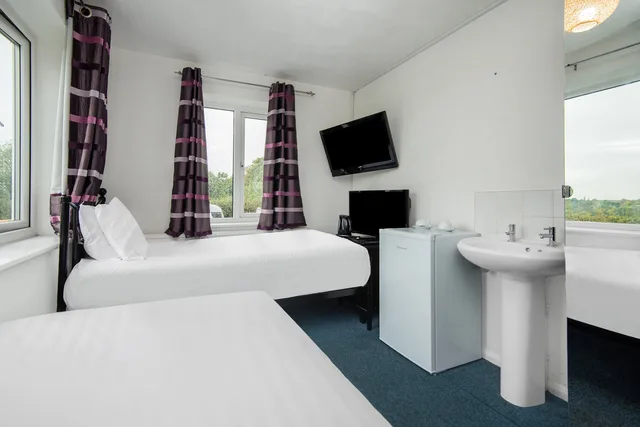 غرفة قياسية بسريرين منفصلين، OYO Chriss Motel 5/10