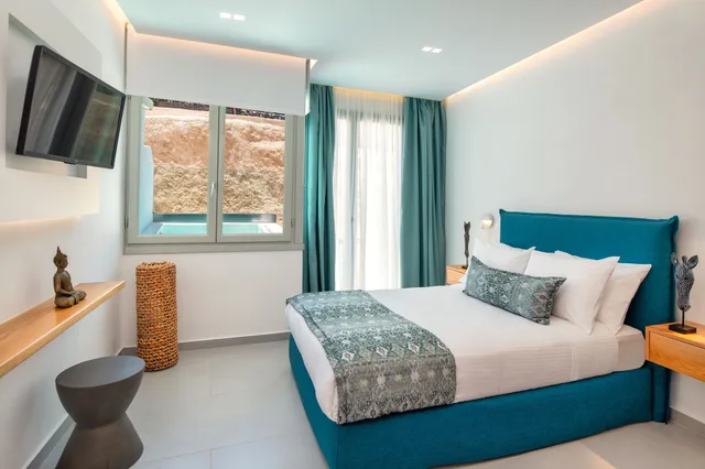 جناح ديلوكس بسرير كوين مع أريكة، Harmony Suites 3/10
