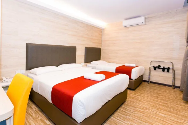 غرفة كومفورت ثلاثية بسرير مزدوج وسرير فردي، Icon Hotel 2/5