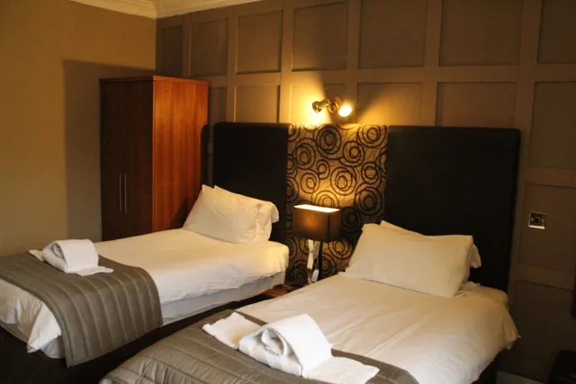 جناح بسرير مزدوج وسرير فردي بحوض استحمام، Glazert Country House Hotel 2/5
