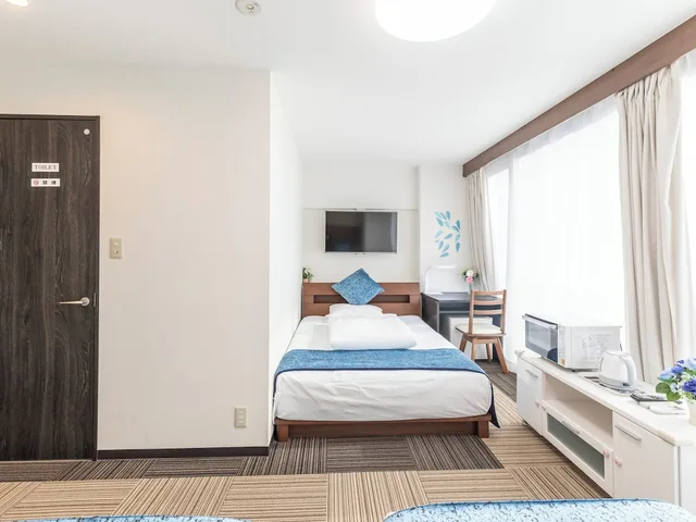 غرفة ثلاثية بسرير مزدوج وسريرين منفصلين في الطابق العلوي، Sakuragawa Riverside Hotel 5/10