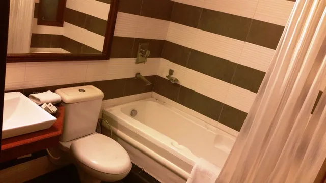 جناح جونيور بسرير كينج مع أريكة، Tavisha Villa Gurgaon 3/3